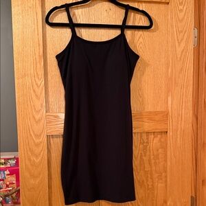 Black body con dress. Adjustable straps. Built in bra. Worn once.